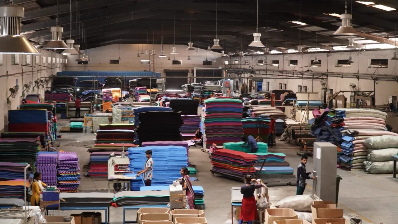 The factory floor with colour-sorted stacks of EVA sheets